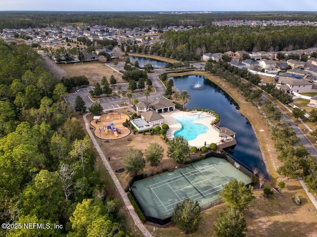 drone / aerial view with a water view