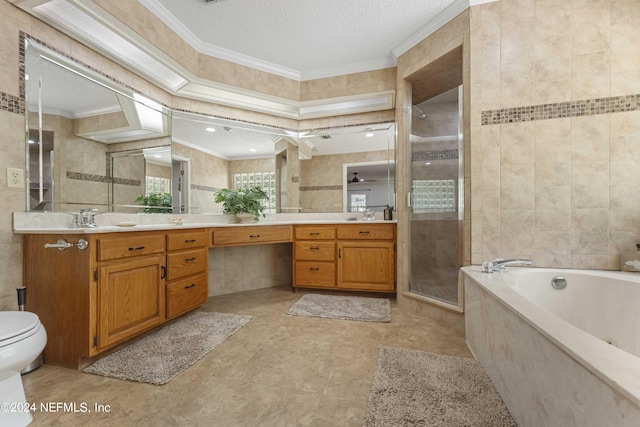 full bathroom with a textured ceiling, toilet, vanity, independent shower and bath, and tile walls