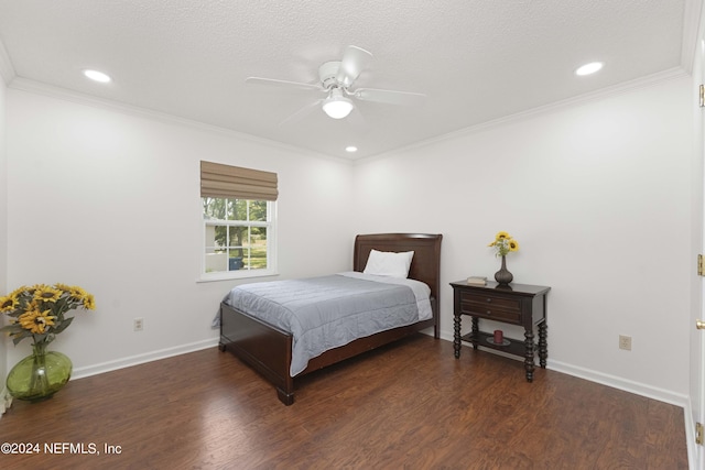 bedroom with a textured ceiling, ceiling fan, dark hardwood / wood-style floors, and crown molding