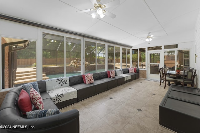 sunroom / solarium with ceiling fan and a wealth of natural light