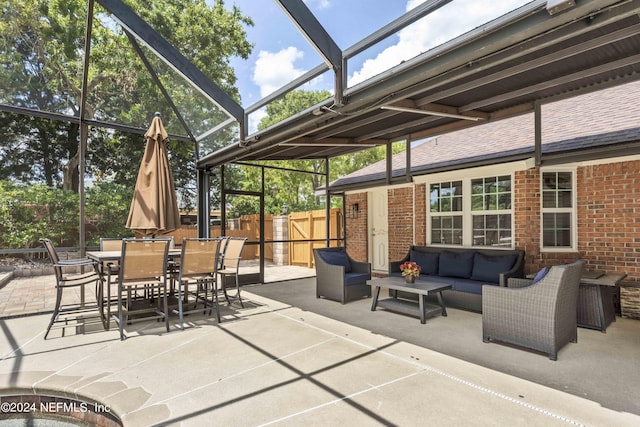 view of patio / terrace with an outdoor hangout area and a lanai