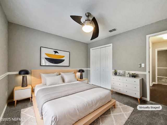 bedroom with ceiling fan and a closet