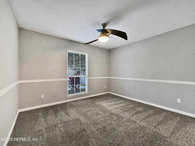 carpeted empty room with ceiling fan