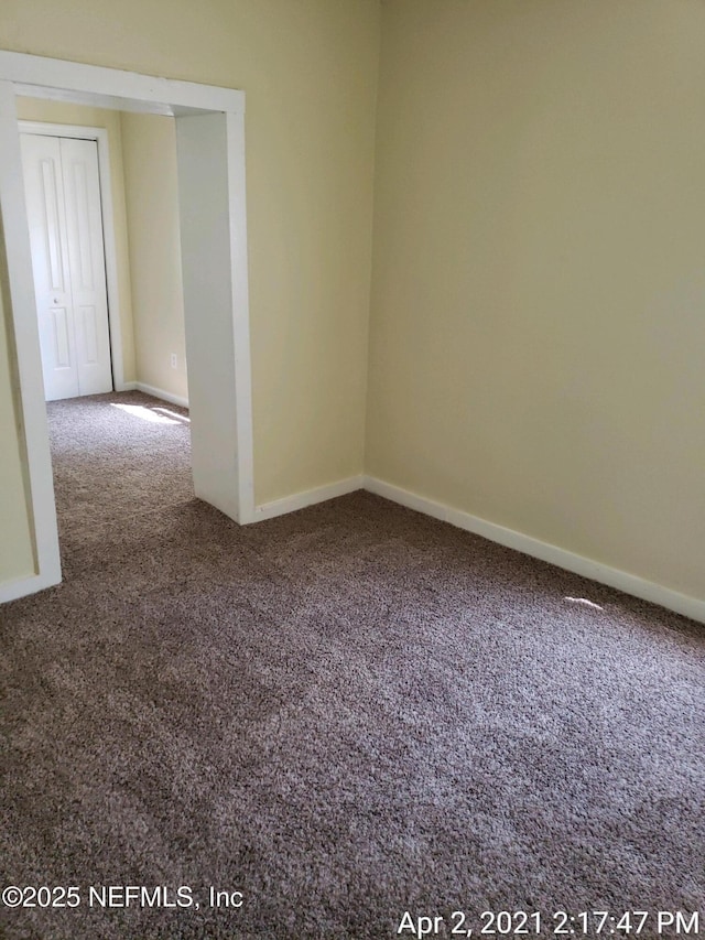 view of carpeted spare room