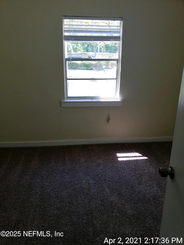 view of carpeted spare room