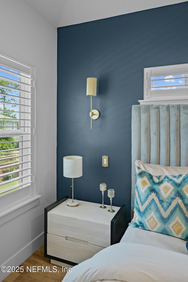 bedroom featuring hardwood / wood-style floors