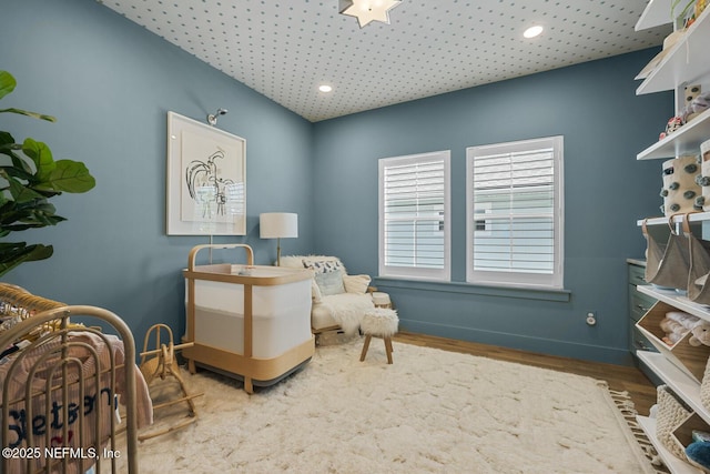 sitting room featuring hardwood / wood-style flooring