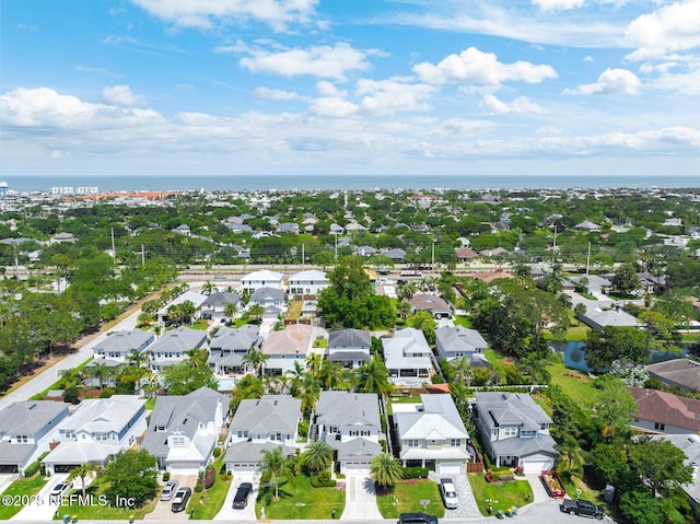 drone / aerial view with a water view