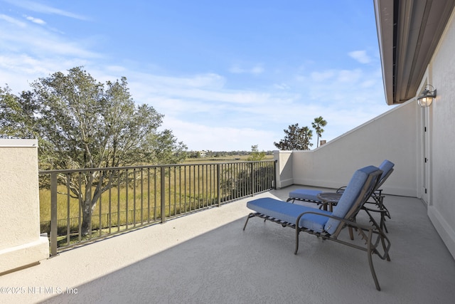 view of patio / terrace with a balcony