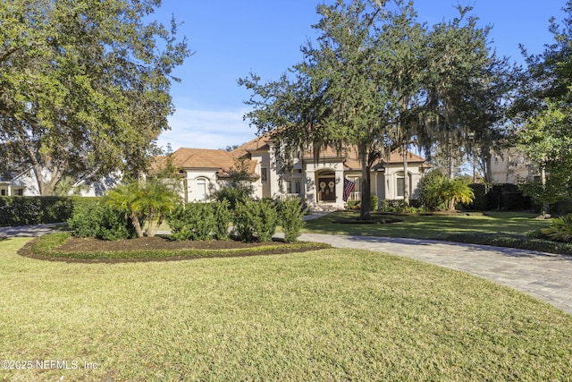 view of front facade with a front yard