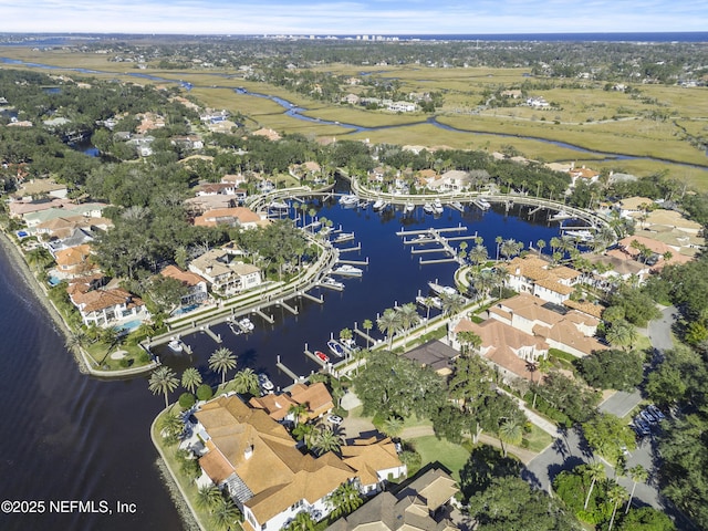 aerial view featuring a water view