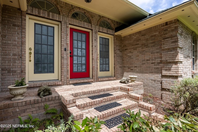 entrance to property featuring a porch