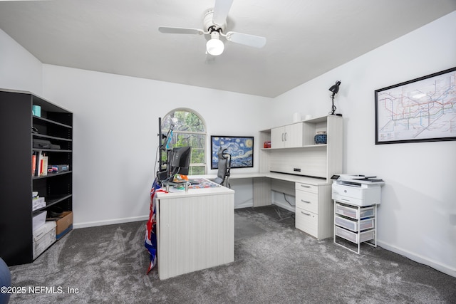 carpeted office space with ceiling fan