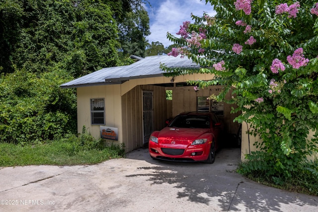 exterior space featuring a carport