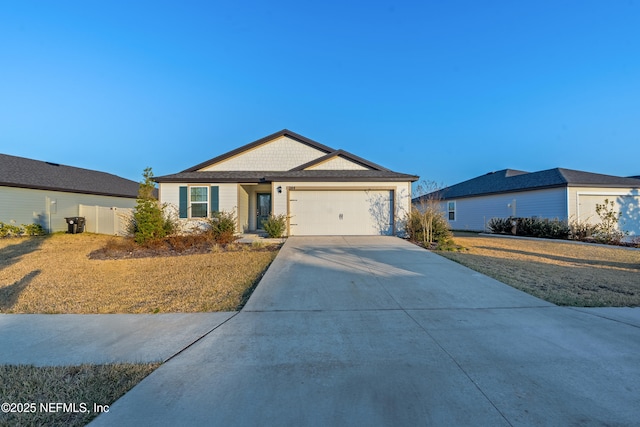 ranch-style house featuring a garage