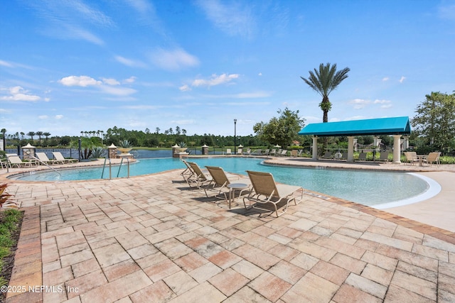 view of swimming pool featuring a patio