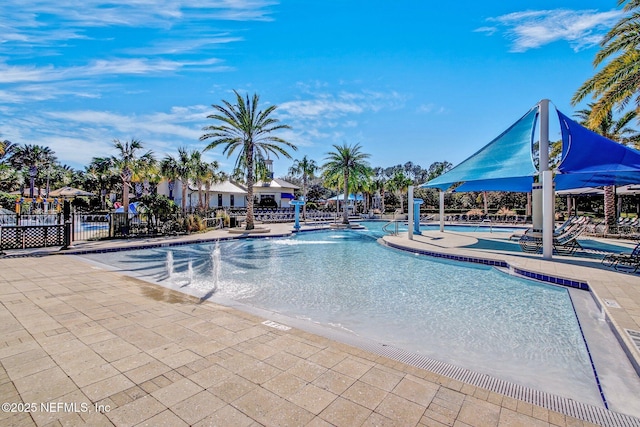 view of swimming pool with a patio area