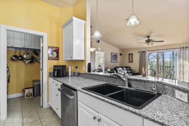 kitchen with white cabinetry, sink, decorative light fixtures, and dishwasher