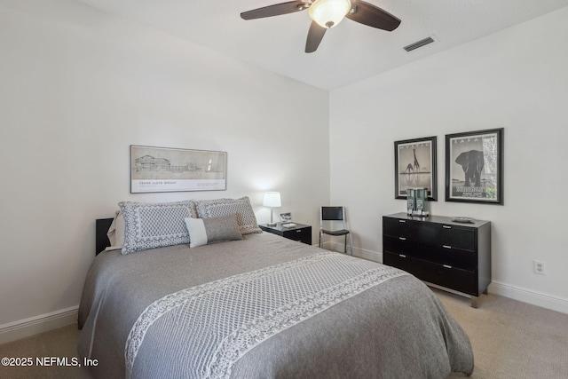 bedroom with light colored carpet and ceiling fan