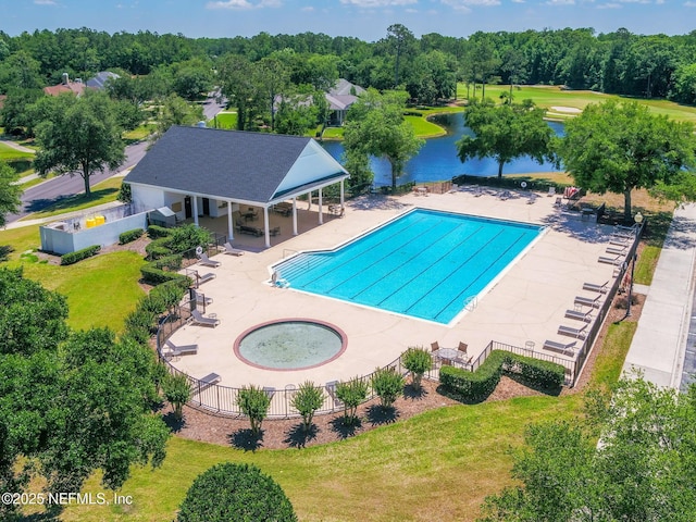 view of pool featuring a patio, a water view, a yard, and a gazebo