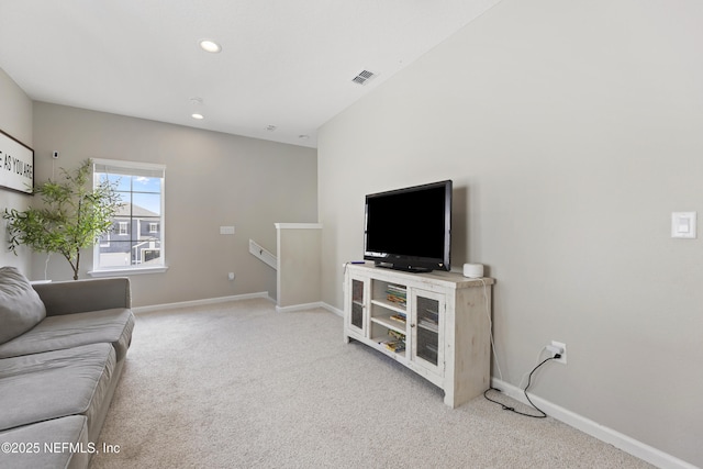 living room with light colored carpet