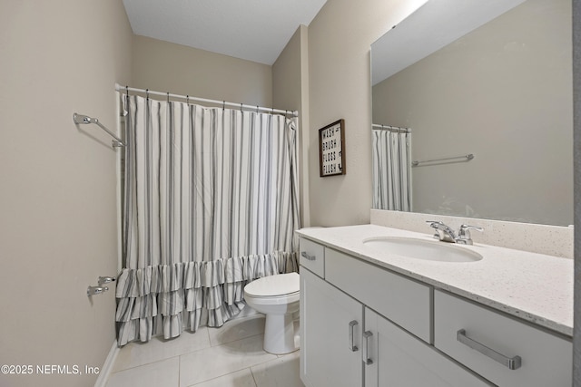 bathroom featuring tile patterned floors, curtained shower, vanity, and toilet