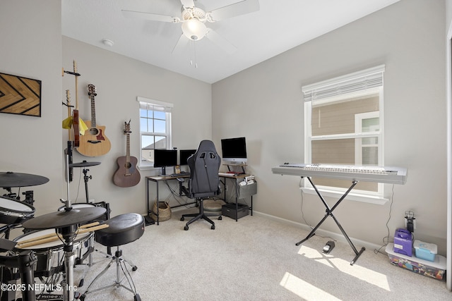 home office featuring carpet flooring and ceiling fan