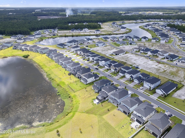 aerial view featuring a water view