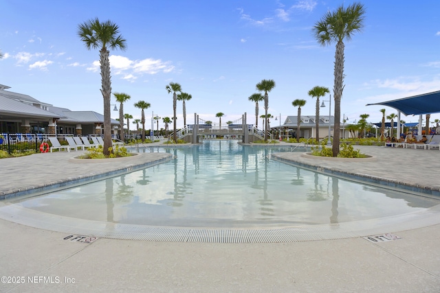 view of swimming pool featuring a patio