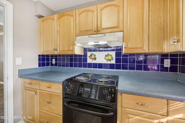 kitchen with light brown cabinetry, tasteful backsplash, black range with electric cooktop, and under cabinet range hood