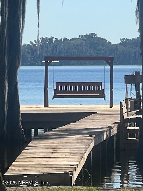 view of dock with a water view