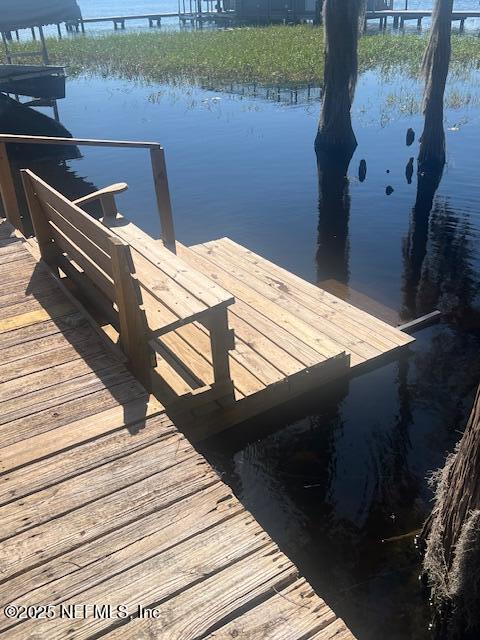 view of dock with a water view