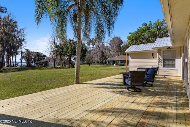 deck featuring a yard