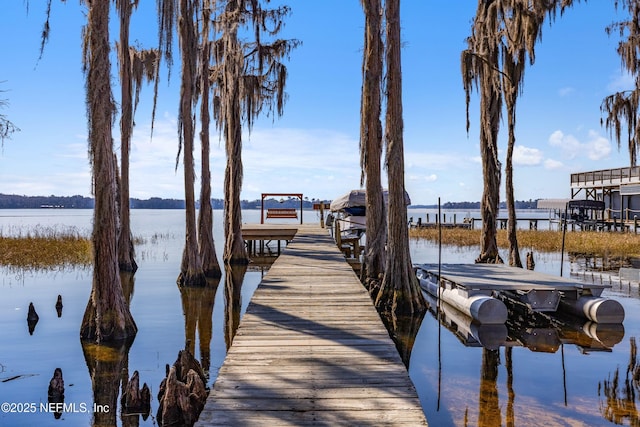 view of dock featuring a water view