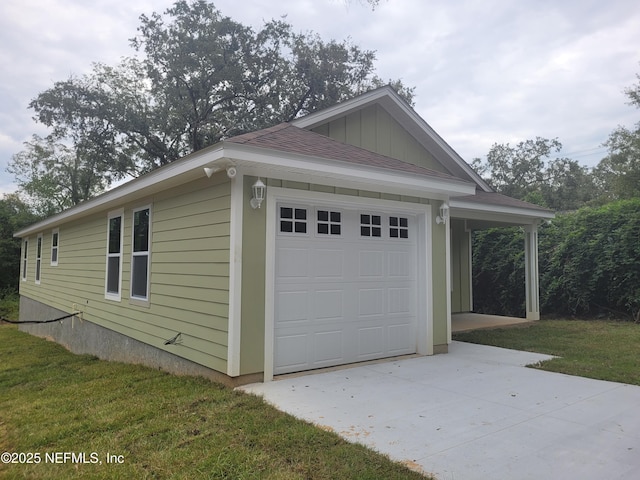 garage featuring a yard