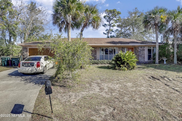 single story home featuring a garage