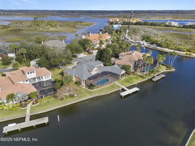 aerial view featuring a water view