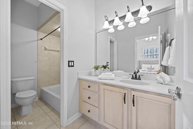 full bathroom with toilet, vanity, tile patterned floors, and tiled shower / bath combo