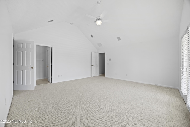 interior space with ceiling fan and high vaulted ceiling