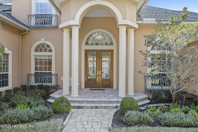 doorway to property with french doors