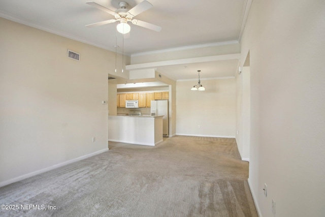 unfurnished living room with ceiling fan with notable chandelier, light colored carpet, and ornamental molding