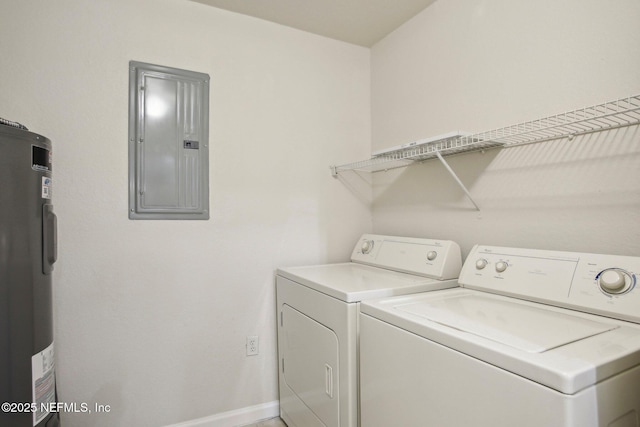 laundry area with water heater, washer and clothes dryer, and electric panel