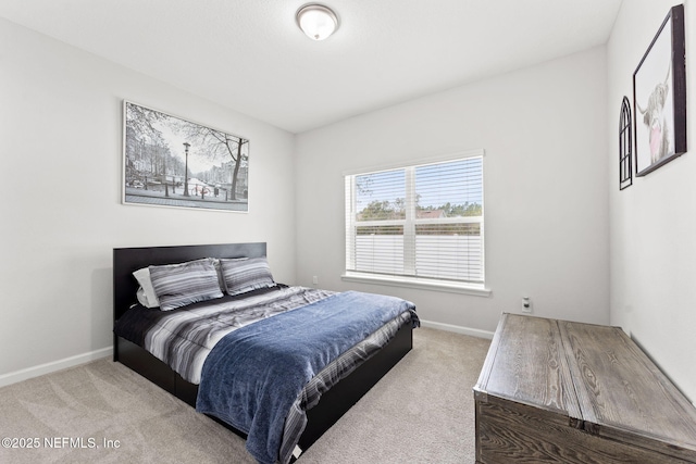 bedroom with light carpet