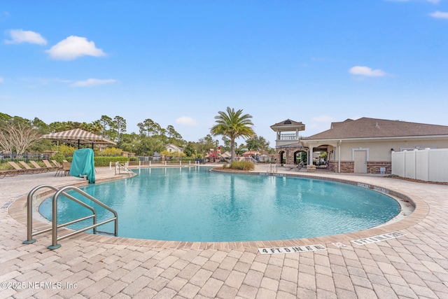 view of swimming pool featuring a patio area