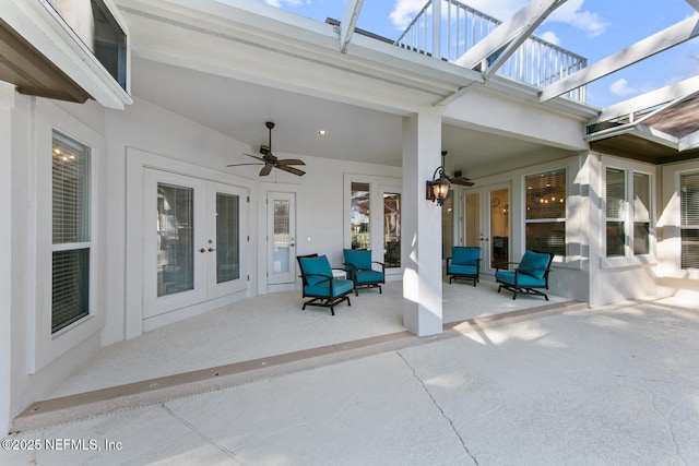 view of patio / terrace with ceiling fan and french doors