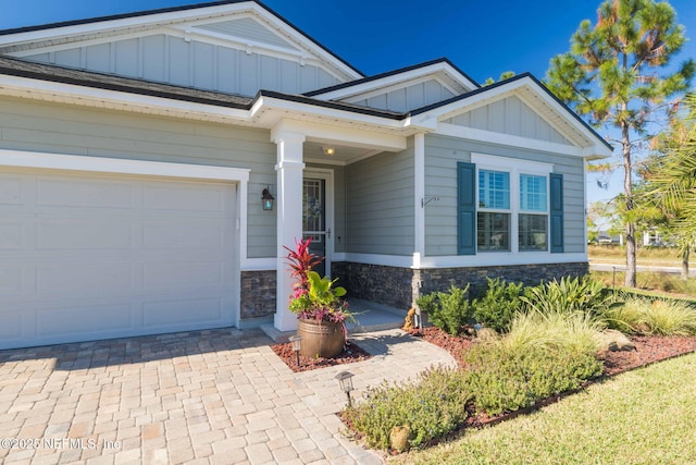 craftsman-style house featuring a garage