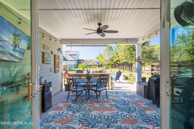 view of patio / terrace featuring ceiling fan