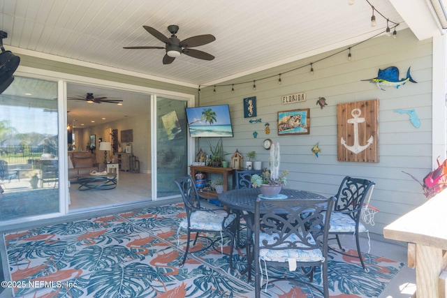 view of patio / terrace featuring ceiling fan