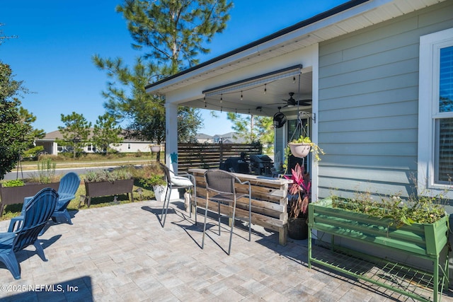 view of patio with ceiling fan