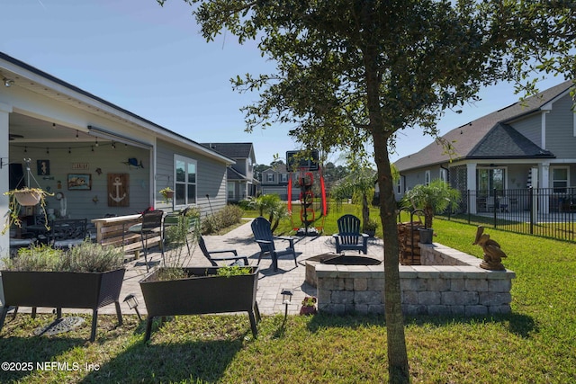 view of patio / terrace featuring an outdoor fire pit